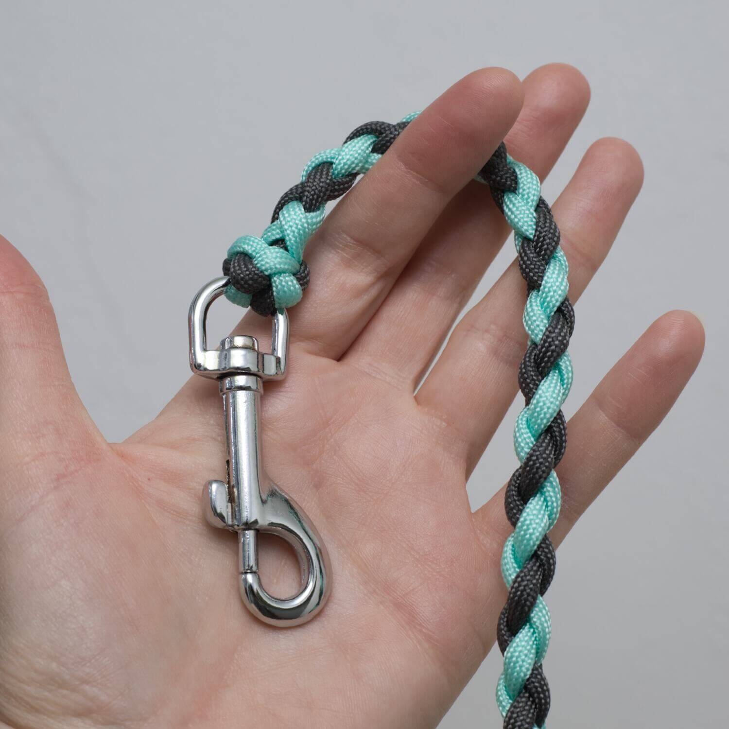 Mint blue and grey round braid dog leash made of 4 strands of 550 paracord.