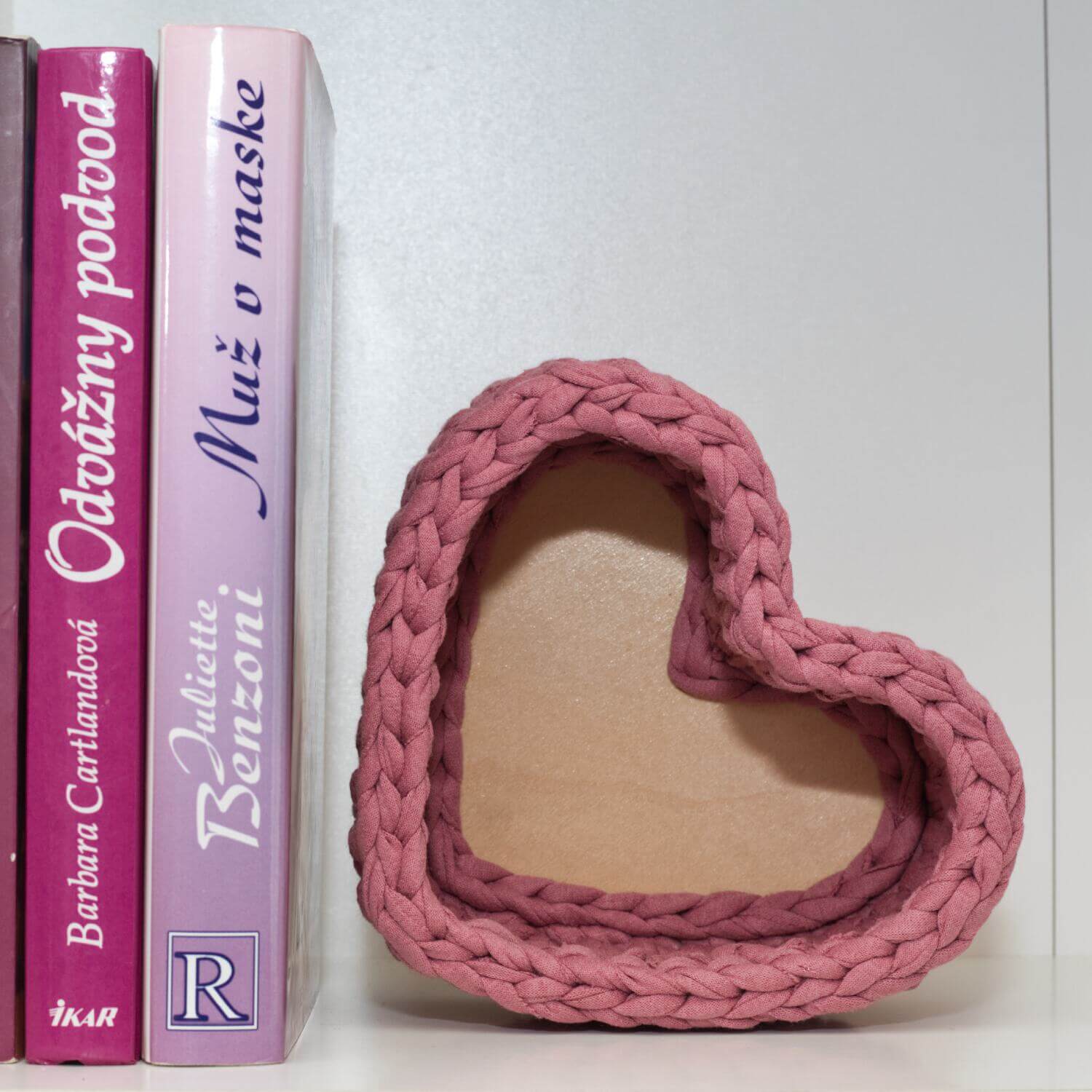 Pink heart shaped crochet basket.